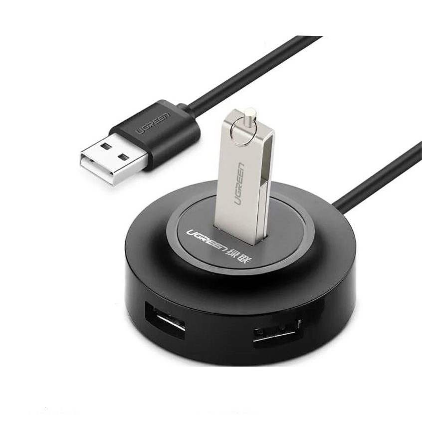 Bộ chia USB 2.0 Ugreen 20277 màu đen với 4 cổng kết nối và 1 USB đang được sử dụng
